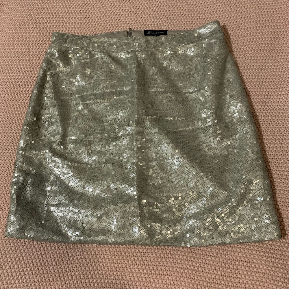 Gold mini skirt size medium from Fashion Nova